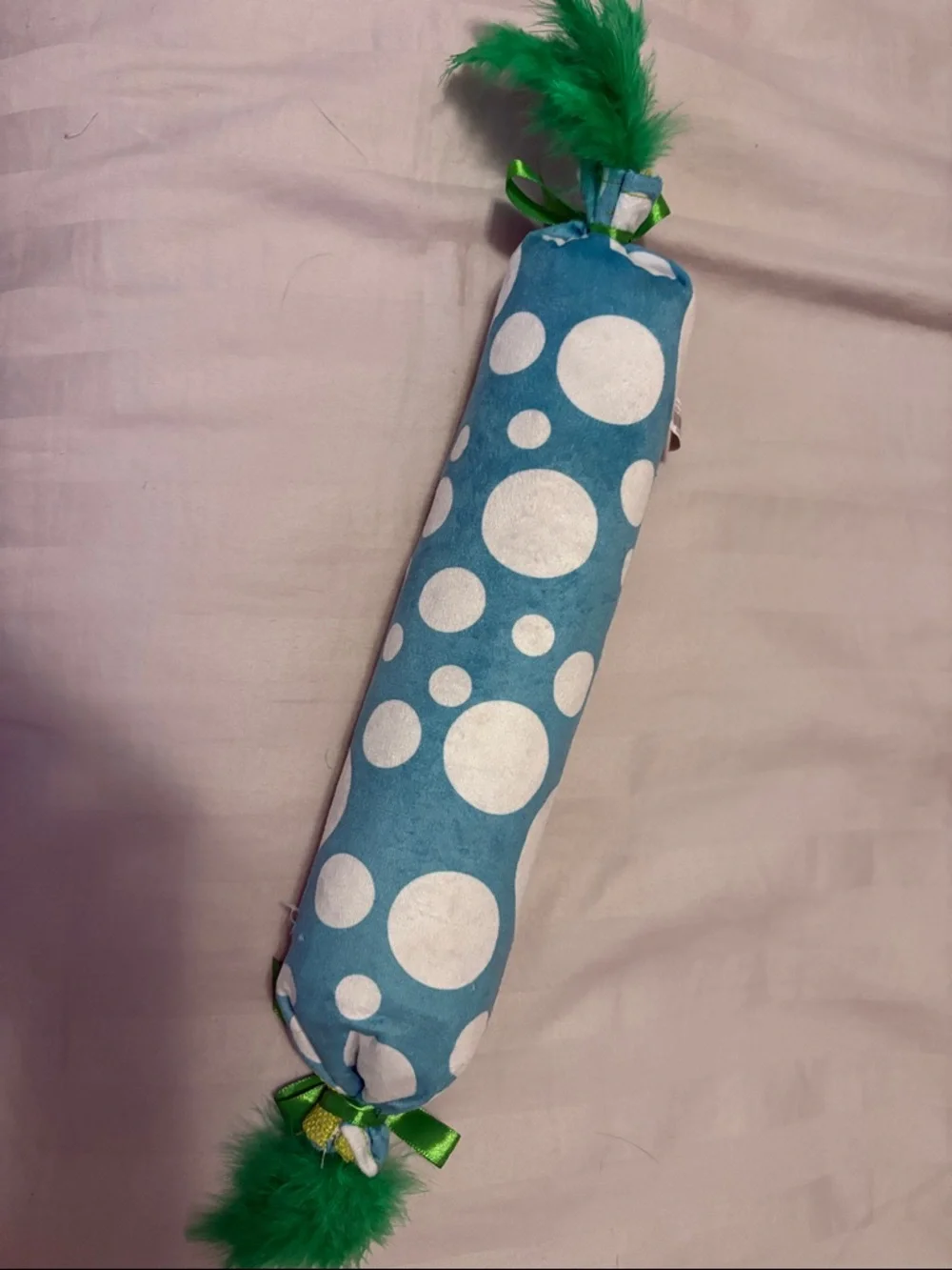 Green Fish Bone Cat Toy with Feather Accents